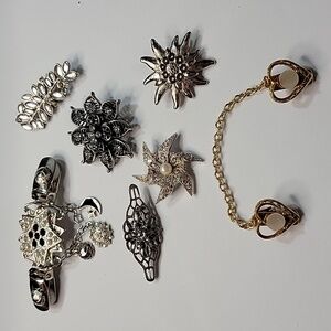 Brooches pendants sweater clips . gold and silver tone mother of pearl ename